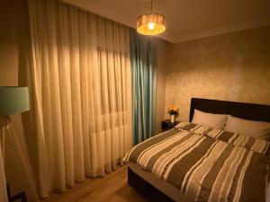 Voodi või voodid majutusasutuse Boutique comfort in the heart of the city toas