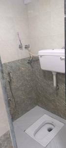 Ένα μπάνιο στο CHHATRAPATI SHIVAJI INTERNATIONAL DORMITORy