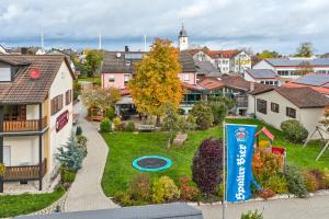 an aerial view of a residential neighborhood with a park at Gasthof Rose in Langenaltheim