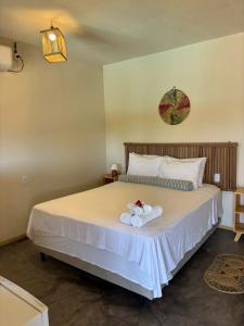 Ένα ή περισσότερα κρεβάτια σε δωμάτιο στο Vila Orun Pousada +19 φωτογραφίες