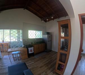 Η κουζίνα ή μικρή κουζίνα στο Quarto Simples e aconchegante