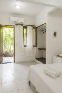 Ένα ή περισσότερα κρεβάτια σε δωμάτιο στο Morada Toniatti