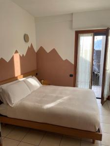 Postel nebo postele na pokoji v ubytování Alps Glow - the sparkle of the Alps