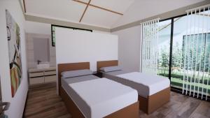 Ένα ή περισσότερα κρεβάτια σε δωμάτιο στο Club Montecarlo Acacias Meta