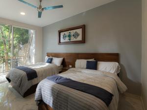 Ένα ή περισσότερα κρεβάτια σε δωμάτιο στο Hotel Bernardino