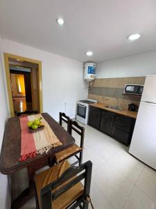 Η κουζίνα ή μικρή κουζίνα στο Apartamento J&A