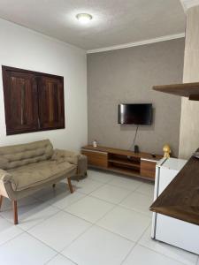 Μια τηλεόραση ή/και κέντρο ψυχαγωγίας στο Hotel Pousada Vila da Natureza