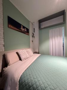 Postel nebo postele na pokoji v ubytování AMA Apartment