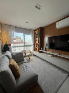 Μια τηλεόραση ή/και κέντρο ψυχαγωγίας στο Edificio Premium 2 dormitórios