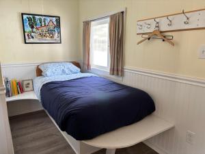 En eller flere senge i et værelse på Talkeetna Gardens, Cabins & Cottages