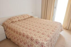 Postel nebo postele na pokoji v ubytování Apartamento Santa Fe + 16 fotografií