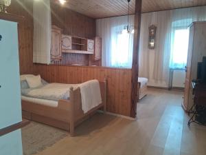 En eller flere senge i et værelse på Heindlhof