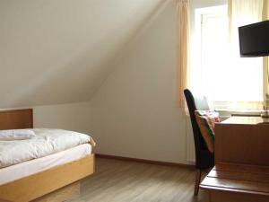 Μια τηλεόραση ή/και κέντρο ψυχαγωγίας στο Hotel Haus Niggemann +8 φωτογραφίες