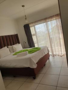 Ένα ή περισσότερα κρεβάτια σε δωμάτιο στο The Blyde resort