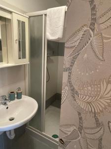 Koupelna v ubytování Alps Glow - the sparkle of the Alps + 14 fotografií