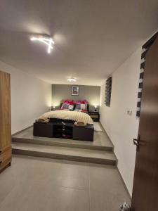 Ένα ή περισσότερα κρεβάτια σε δωμάτιο στο Ferienwhonung Mihy