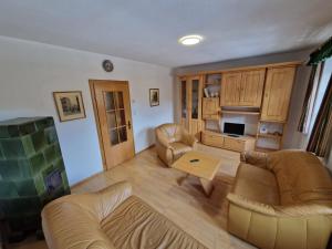 O zonă de relaxare la Ferienwohnungen Viktoria Buchegger +5 fotografii