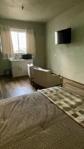 TV/trung tâm giải trí tại Casa Jlee