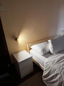 Ένα ή περισσότερα κρεβάτια σε δωμάτιο στο Miquinhas Norte +2 φωτογραφίες