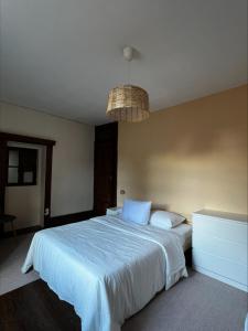 Ένα ή περισσότερα κρεβάτια σε δωμάτιο στο Miquinhas Norte