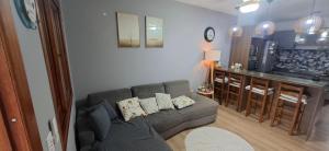 Et opholdsområde på Casa aconchegante com piscina em Nova Tramandai + 16 billeder