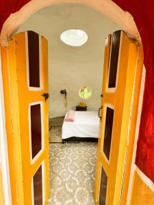 Ένα ή περισσότερα κρεβάτια σε δωμάτιο στο Ananda Glamping Holistico