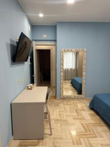 TV a/nebo společenská místnost v ubytování Da Delfina Affittacamere + 31 fotografií