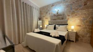 Postel nebo postele na pokoji v ubytování Hermione's house