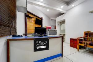 Η κουζίνα ή μικρή κουζίνα στο Collection O Erattupetta Formerly City Residency