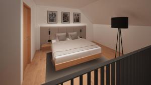 Ένα ή περισσότερα κρεβάτια σε δωμάτιο στο Hotel Sončno polje