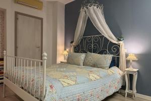 Ένα ή περισσότερα κρεβάτια σε δωμάτιο στο Residenza Fiori di Grano