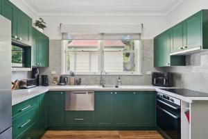 Kuchyň nebo kuchyňský kout v ubytování Pine Lodge