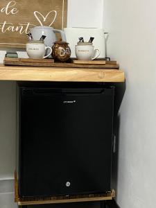 Η κουζίνα ή μικρή κουζίνα στο L'Isménia, L'écrin Zen