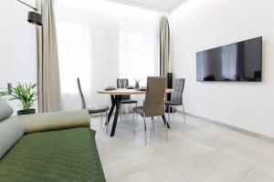 A television and/or entertainment centre at Apartment house in Vienna