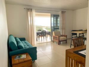 Χώρος καθιστικού στο Hei Tiare Apartment