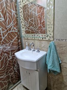 Ένα μπάνιο στο Alojamiento la Colonia