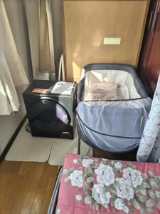 Ένα ή περισσότερα κρεβάτια σε δωμάτιο στο Southern Alps Kaikomagatake Foot of the Kaikoma