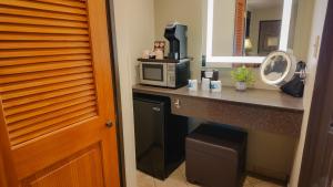 Kuchyň nebo kuchyňský kout v ubytování Adelaide Inn