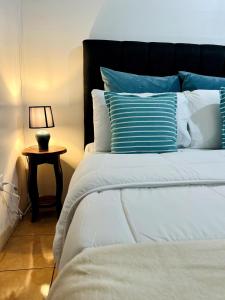 Ένα ή περισσότερα κρεβάτια σε δωμάτιο στο Alto Cruz Executive Loft