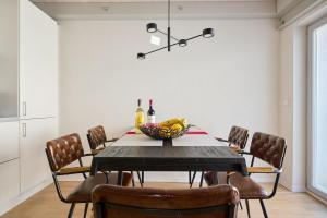 Φωτογραφία από το άλμπουμ του Gartenwohnung-Terrasse-3 Schlafzimmer-85ZollTV-Arcade 