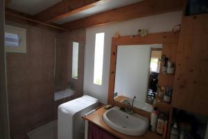 Koupelna v ubytování Maison de vacances à l'Océan + 9 fotografií