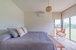 Postel nebo postele na pokoji v ubytování MOT Wine Country 3 Bd Villa Tupungato