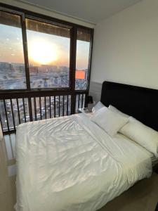 Ένα ή περισσότερα κρεβάτια σε δωμάτιο στο View