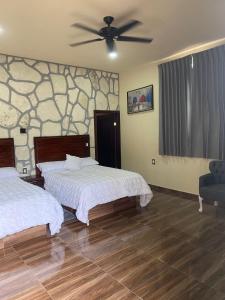 Ένα ή περισσότερα κρεβάτια σε δωμάτιο στο Terraza Peñasco