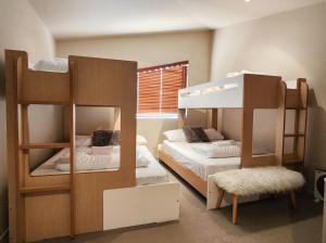 Ένα ή περισσότερα κρεβάτια σε δωμάτιο στο Snow Stream 8