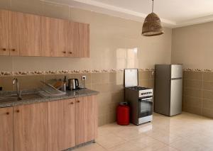 Η κουζίνα ή μικρή κουζίνα στο Massira Social Living - Locanda Collective