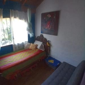 En eller flere senge i et værelse på el ceibo + 9 billeder