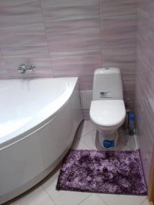 Ванная комната в Apartment at Komsomolska 52А