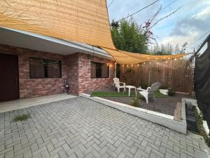 Κήπος έξω από το Executive Apartment Escazú