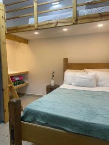 Ένα ή περισσότερα κρεβάτια σε δωμάτιο στο Casa Santa Rosa Garden +13 φωτογραφίες